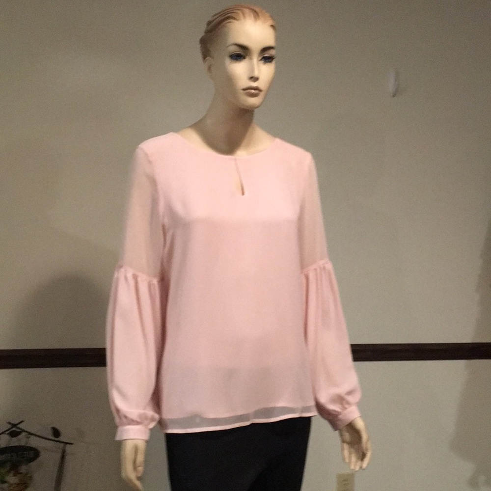 Express long-sleeved pullover top.